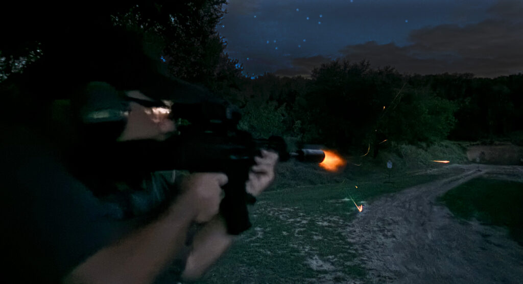 Flash from a suppressed rifle at night